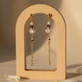 Purple & golden pearl earrings